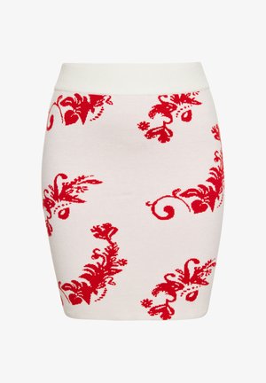 Minifalda de punto en crema con un patrón floral rojo, que presenta una cinturilla acanalada y un diseño ajustado para una silueta ceñida.