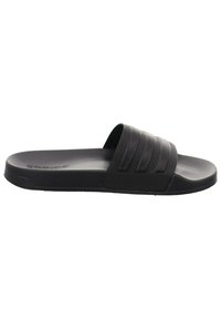Black slide sandal featuring a flat sole, textured upper with three horizontal stripes, and a smooth finish for easy wear.
