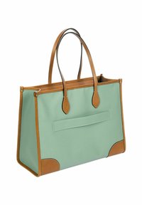Borsa a tracolla verde menta con dettagli in pelle marrone, caratterizzata da un design strutturato, manici lunghi e una tasca frontale con contorno cucito.