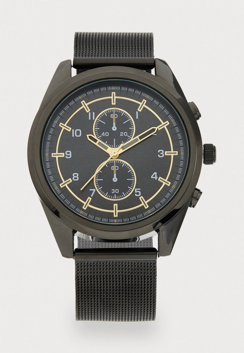 Schwarze Metallarmbanduhr mit einem dunklen Ziffernblatt, goldenen Akzenten, zwei Subdials, markanten Stundenmarkierungen und einem strukturierten schwarzen Mesh-Armband.