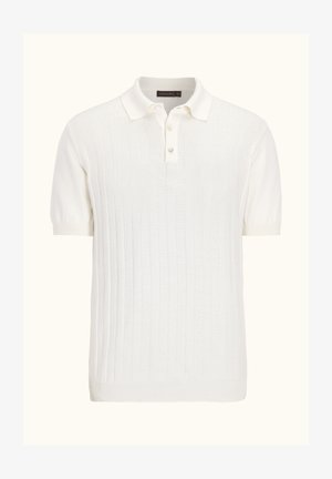 Witte polo met korte mouwen, voorzien van een textuur rib patroon, een twee-knoopsluiting en gebreide kraag en mouwen. Zachte stofafwerking.