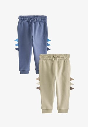 To børnebukser med elastisk talje og snore, en blå med blå og marineblå pigge, og en beige med beige og brune pigge.