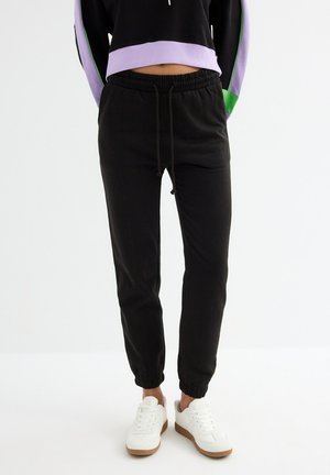 JOGGER  - Pantalones deportivos - black