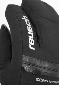 Guantes negros con etiqueta impermeable. Fabricados con un material suave y texturizado. Incluye un detalle en cuero y un bolsillo con cierre.