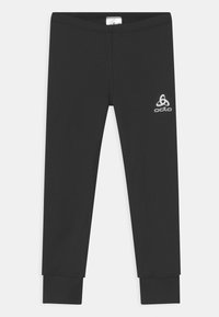 Schwarze Leggings aus elastischem Stoff, mit eng anliegendem Design, schmalen Bündchen und einem kleinen weißen Logo am oberen linken Bein.