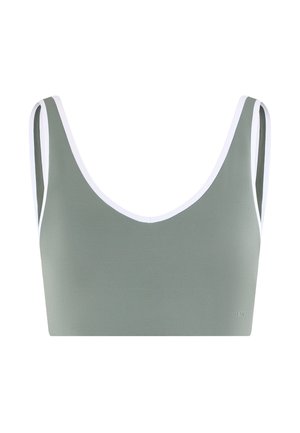 Reggiseno sportivo verde chiaro con scollo tondo e spalline larghe, con un piccolo logo in basso a destra.