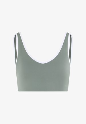 Reggiseno sportivo verde chiaro con scollo tondo e spalline larghe, con un piccolo logo in basso a destra.