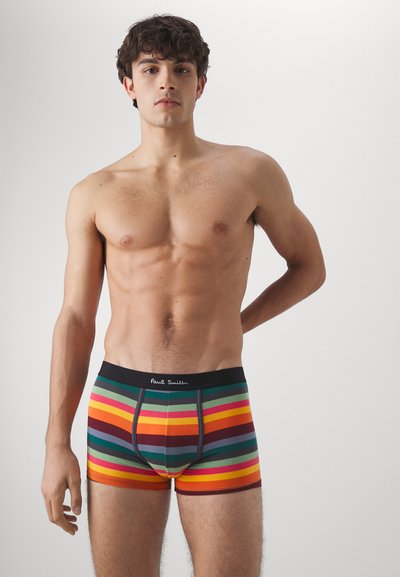 Boxers rayés orange, vert et violet avec une taille noire arborant le logo "Paul Smith". Tissu doux, design ajusté.