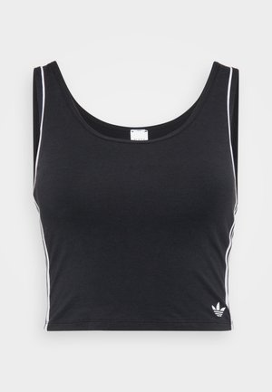 Čierny crop top vyrobený z mäkkej tkaniny, s bielymi bočnými pruhmi a malým logom na leme. Zaoblený výstrih a bezrukávový dizajn.