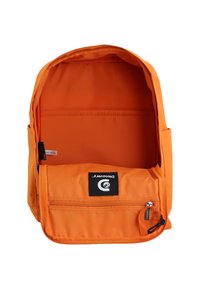 Orange backpack with a zippered compartment, smooth fabric, interior mesh pocket, and a logo patch on the front.