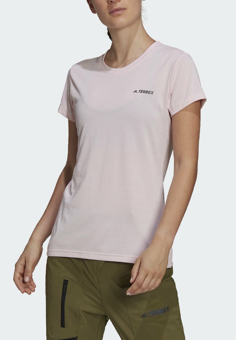 Rosa, kurzärmliges T-Shirt aus strukturiertem Material mit rundem Halsausschnitt und schwarzem "TERREX"-Logo auf der linken Brust.