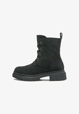 Black suede lace-up ankle boot with thick treaded sole and pull tab at back, shown from the left side on a white background.