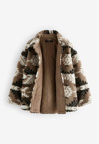 Brun fuskpälsjacka med vitt och svart geometriskt mönster, knäppning fram och en beige innerfoder. Tjock, oversized design.