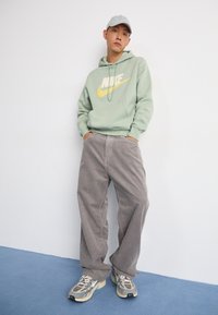 Nike Sportswear M NK CLUB BB PO CHNL FTRA - Majica s kapuljačom - jade horizon