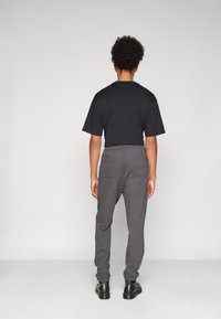 AllSaints UNDERGROUND - Tepláky - shaded grey