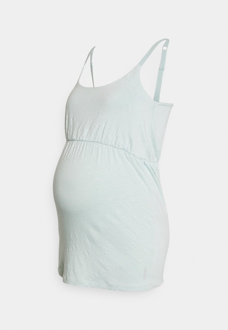 Top de maternidade verde-claro com alças finas, corpete ajustado, cintura franzida e textura suave. Adequado para uso durante a gravidez.