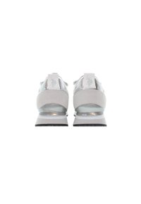 Grey and silver sneakers with a smooth texture, rounded shape, and a small heel. Reflective accents and a logo on the heel tab.