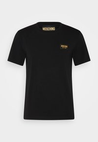 Svart bomullst-shirt med korta ärmar, rund halsringning och en guld logotags märkta "Moschino Milano" på bröstet.