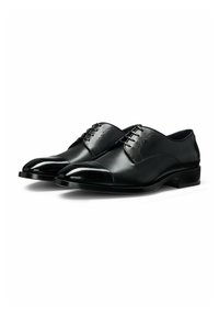 Black leather dress shoes with a polished finish, round toe, and detailed lace-up design. Features a smooth texture and low stacked heel.