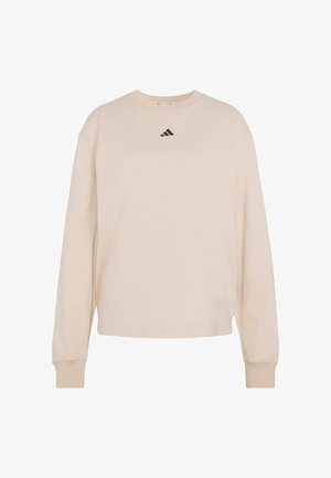 Světlé béžové mikina s dlouhými rukávy vyrobená z bavlny. Má kulatý výstřih, žebrované manžety a na hrudi vyšívané černé logo.