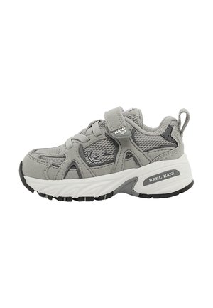 Gray athletic shoe featuring a mesh and suede upper, Velcro strap, rounded toe, thick white midsole, and black rubber outsole.