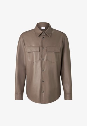 Brown leather shirt with a pointed collar, long sleeves, and two chest pockets. Features black buttons and smooth texture.