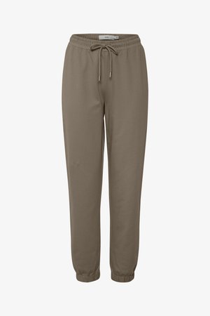 Pantalons de jogging kaki avec taille élastique et cordon de serrage, dotés de chevilles côtelées et d'une texture de tissu lisse et douce.
