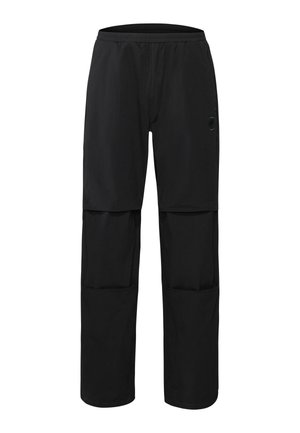 Zwarte outdoorbroek voor heren met afritsbare knieën en elastische tailleband, ontworpen voor wandelen of casual gebruik.