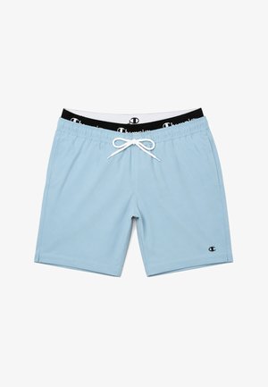 Short de bain bleu clair avec taille élastique noire affichant des logos blancs "Champion", cordon blanc à l'avant, et petit logo Champion sur la jambe gauche.
