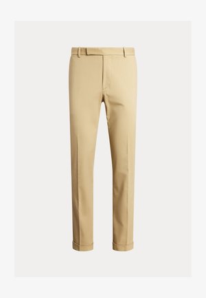 Chinos caqui feitos de um tecido de algodão suave, com um design ajustado, pregas frontais e punhos no tornozelo para um visual afinado.