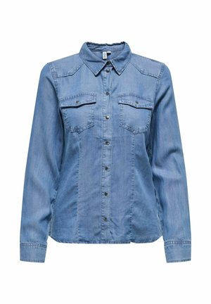 Denim shirt in light blue, featuring a collar, long sleeves, two chest pockets, and silver snap buttons along the front. Smooth texture.