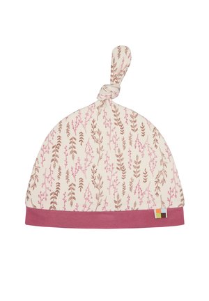 Verknotete Babymütze aus weicher Baumwolle, mit einem cremefarbenen Hintergrund, der mit rosa und braunen botanischen Drucken verziert ist, sowie einem rosa Bündchen am unteren Ende.