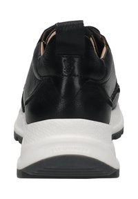 Black leather sneaker with a textured finish, white midsole, and a pull tab at the heel. Features subtle branding on the side.