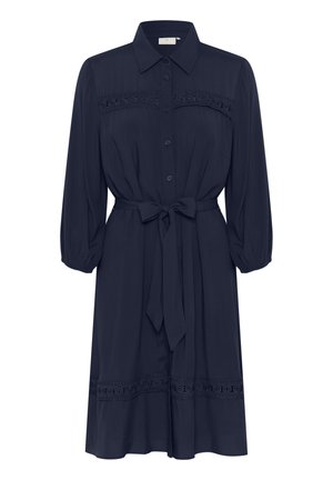 Robe bleu marine à boutons avec une taille cintrée, manches bouffantes 3/4 et dentelle sur la poitrine et l'ourlet. Tissu lisse, longueur genoux.