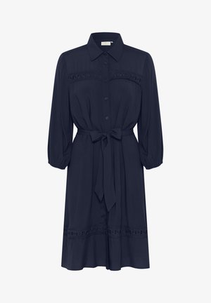 Robe bleu marine à boutons avec une taille cintrée, manches bouffantes 3/4 et dentelle sur la poitrine et l'ourlet. Tissu lisse, longueur genoux.