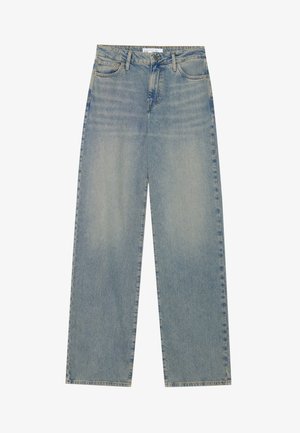 Heledad sinine kõrge vöökoht ja sirged sääred denim teksad, millel on esikotid, vööloopid ja nähtav nupuga ja lukuga suletav osa.