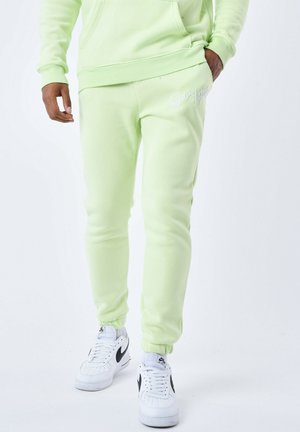 BASIC FULL LOGO - Pantalones deportivos - jaune fluo