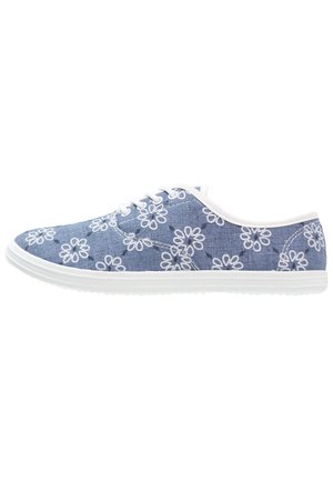 Blue canvas shoes featuring white floral embroidery, round toe design, white rubber sole, and white lace-up closure.