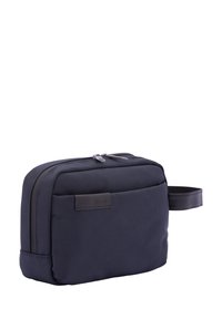 Borsa da toaletta rettangolare di colore blu navy realizzata in tessuto testurizzato, dotata di una chiusura con cerniera superiore e di una maniglia laterale per un facile trasporto.