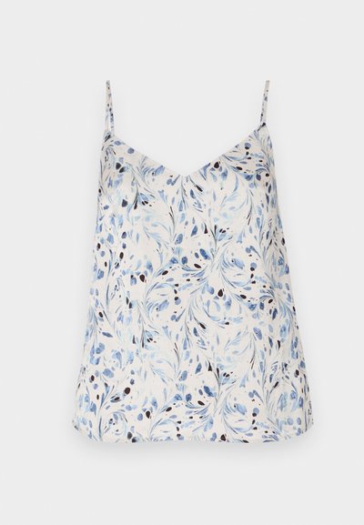 White sleeveless top featuring a floral pattern in blue and black. V-neck design with thin straps and a relaxed fit. Smooth fabric texture.