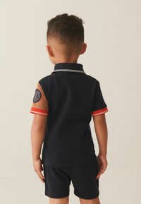 Next SHORT SLEEVES SET STANDARD - Tréningruha alsók - red blue