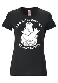 Black cotton t-shirt featuring a white graphic of a character with large eyes and cookie designs, with text: "Come to the dark side, we have cookies."