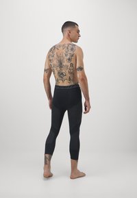 Dynafit SPEED DRYARN TIGHTS - Legingi - black out