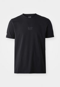 T-shirt noir à manches courtes en tissu lisse, avec le logo EA7 en impression subtile sur la poitrine et un col arrondi.
