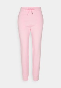 Rosa bomullsträningsbyxor med dragsko i midjan, avsmalnande ben och elastiska muddar. Slät textur med ett enhetligt färgmönster.