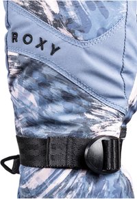 Blå- och gråmönstrad skidhandske med ett svart justerbart band och spänne, med "Roxy"-logotypen i svart broderi.