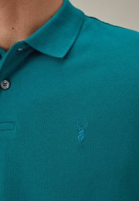 Next REGULAR - Poloshirt - teal blue