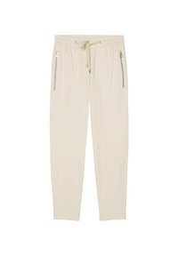 Beige joggers med elastisk midja, dragsko, två sidofickor med dragkedja, smalnade ben och en mjuk, len textur.