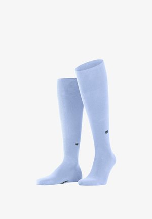 Calzini azzurri fino al ginocchio realizzati in materiale liscio. Presentano una trama a coste nella parte superiore e un piccolo logo nero sul lato.