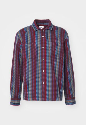 Long-sleeve button-up shirt featuring a maroon, blue, and green striped pattern, with two chest pockets and a collared neckline.
